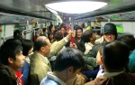 Crowded subway ride in Hong Kong.